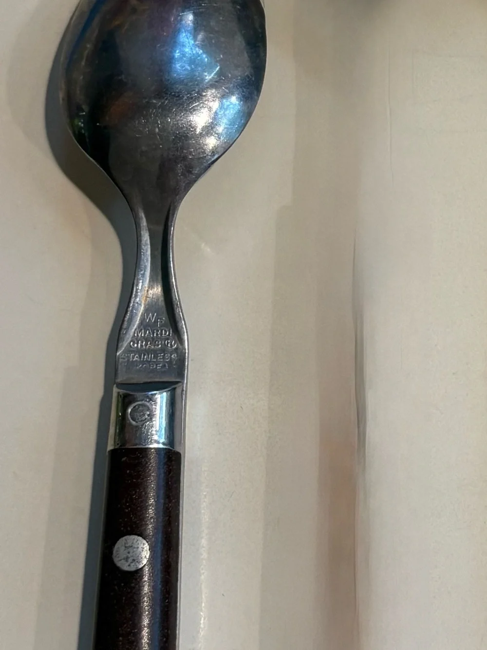 Washington Forge stainless spoon with brown handle rivets Korea Vintage